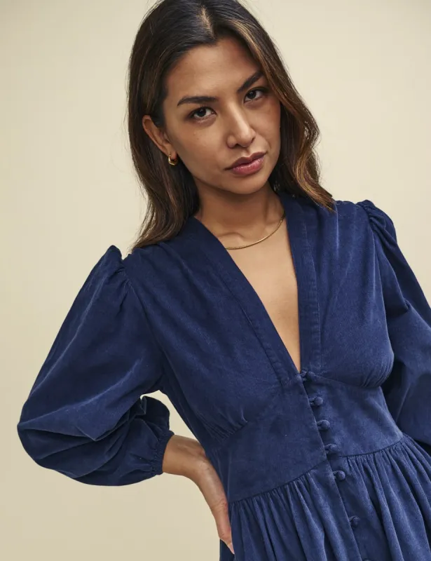 Navy Cord Starlight Long Sleeve Mini Dress sold by Nobody's Child