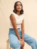 White Slash Neck Mock-Crochet Top sold by Nobody's Child