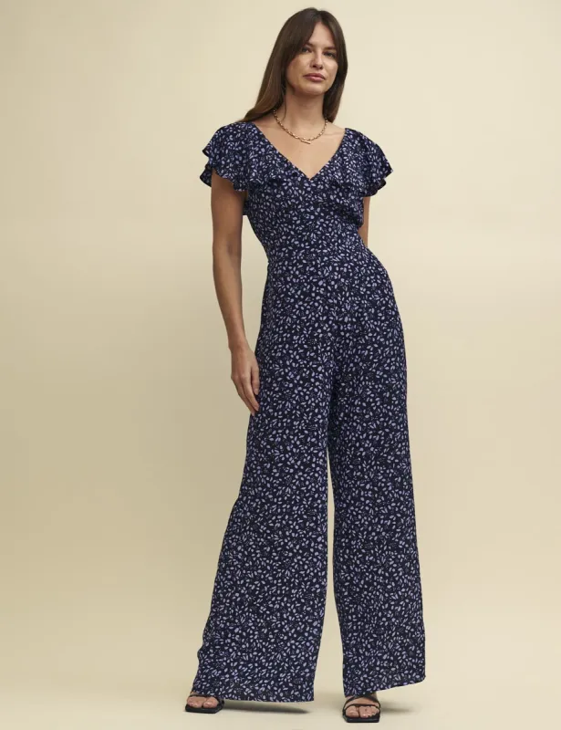 Purple Ditsy Floral Flutter Sleeve Suki Jumpsuit sold by Nobody's Child