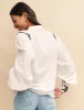 White Floral Embroidered Blouse sold by Nobody's Child