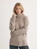 Beige Oversized Roll Neck Wool Knitted Jumper sold by Nobody's Child