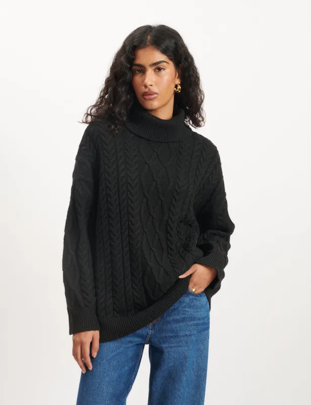 Black Cable Knitted Roll Neck Jumper sold by Nobody's Child