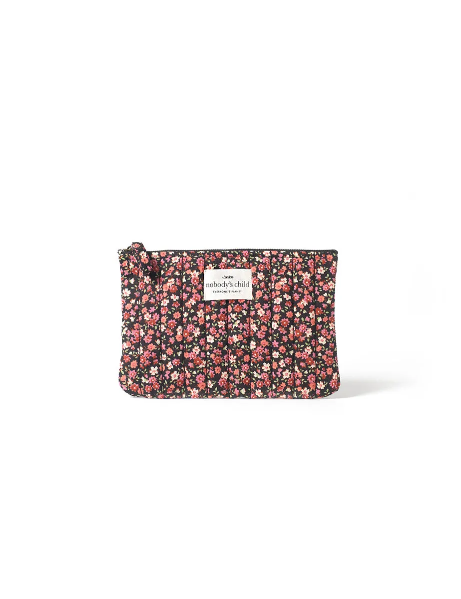 Black Ditsy Floral Makeup Pouch sold by Nobody's Child