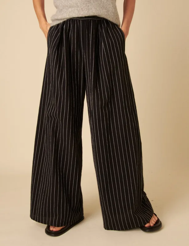 Black Pinstripe Jerrow Wide Leg Trousers sold by Nobody's Child