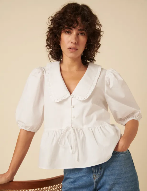 White Puff Sleeve Tie Front Blouse sold by Nobody's Child