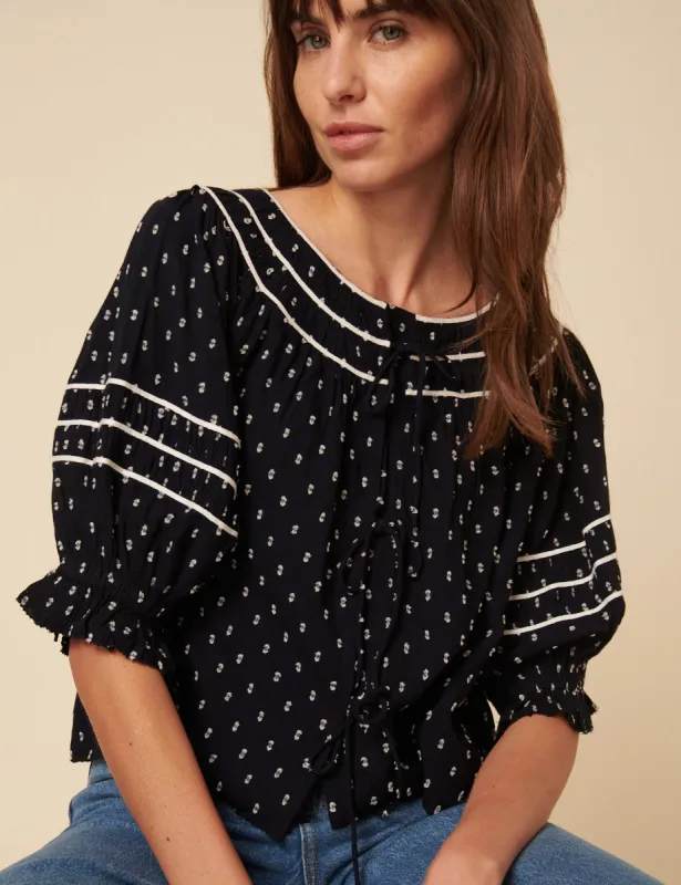 Navy Tie Front Dobby Embroidered Blouse sold by Nobody's Child