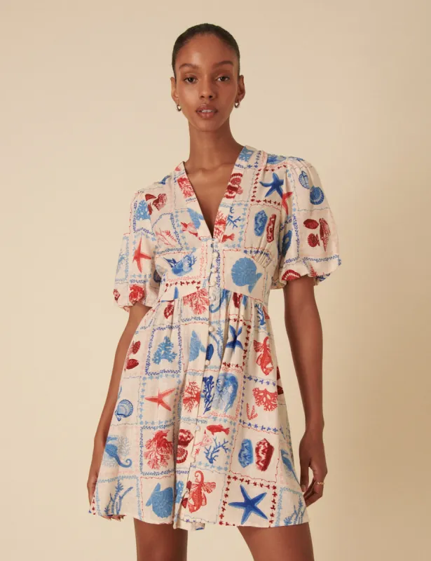 Cream Shell Print Starlight Mini Dress sold by Nobody's Child