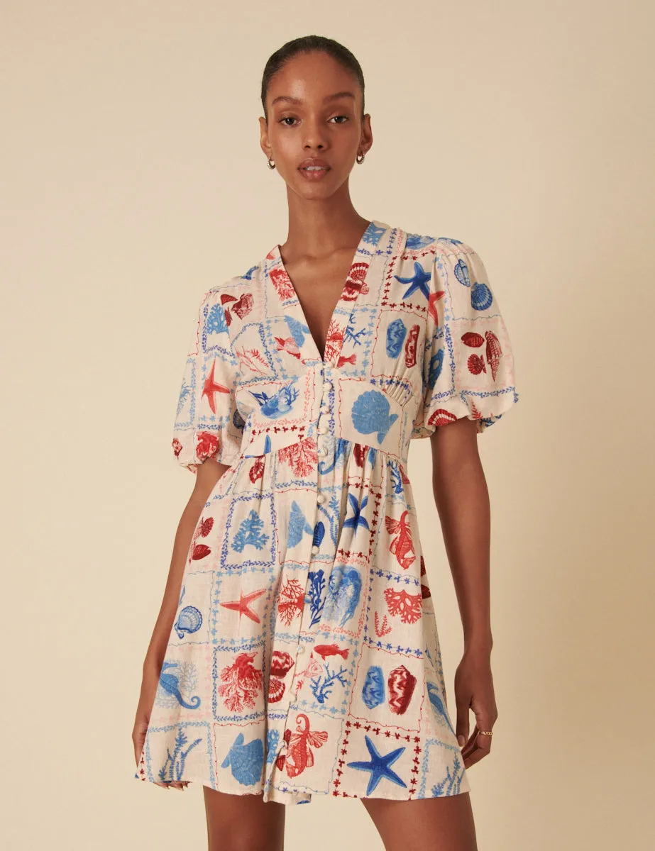 Cream Shell Print Starlight Mini Dress sold by Nobody's Child