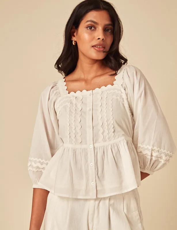 White Peplum Blouse sold by Nobody's Child