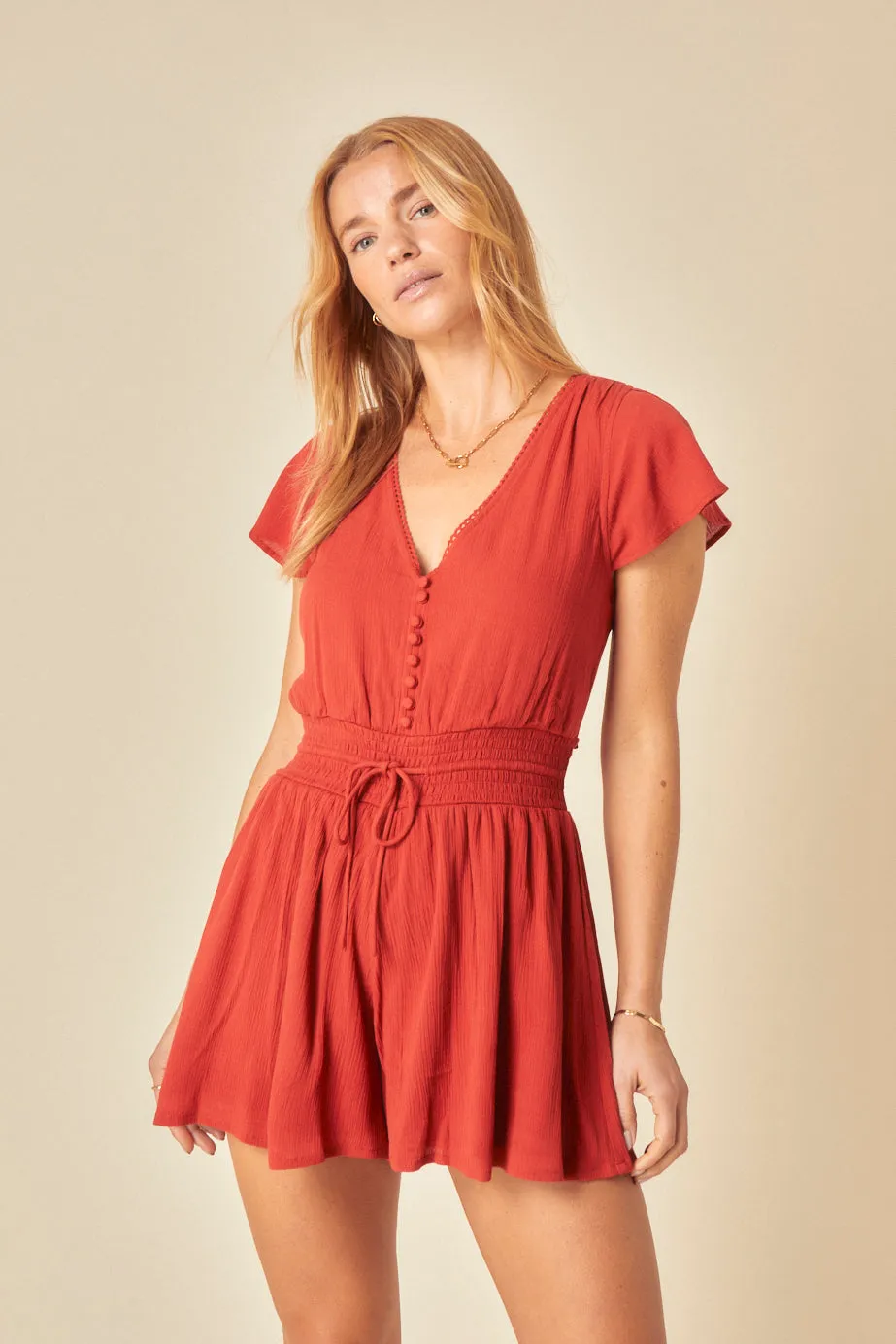 Red Veda Playsuit sold by Nobody's Child