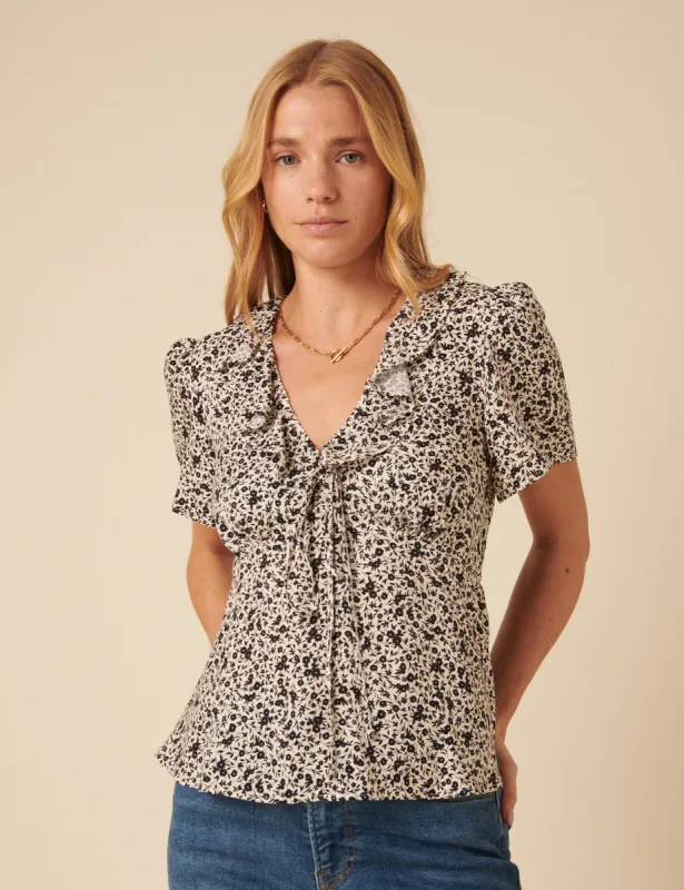 Black Floral Frill Sleeve Top sold by Nobody's Child