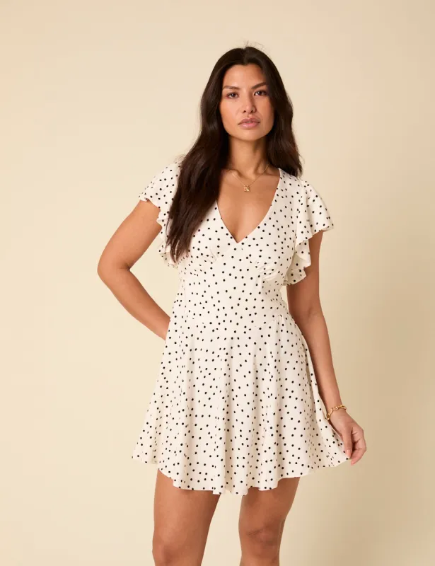 White Polka Dot Loubelle Mini Dress sold by Nobody's Child
