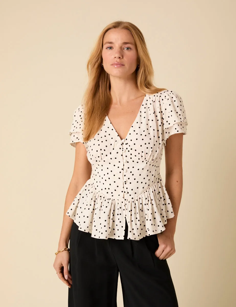 White Polka Dot Loubelle Top sold by Nobody's Child