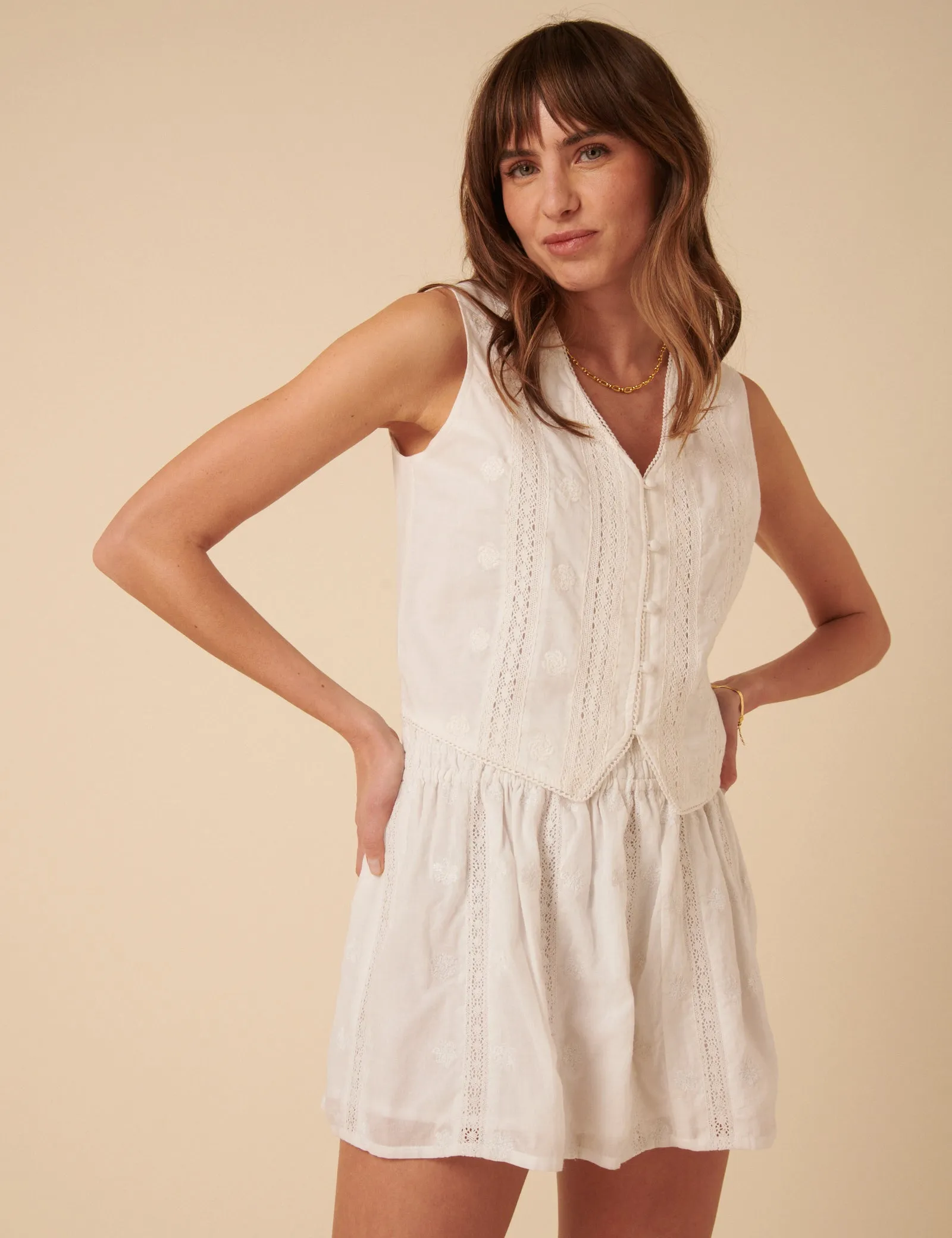 White Embroidered Lace Trim Mini Skirt sold by Nobody's Child