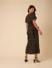 Black Polka Dot Ruffle Lyndsey Midi Dress sold by Nobody's Child