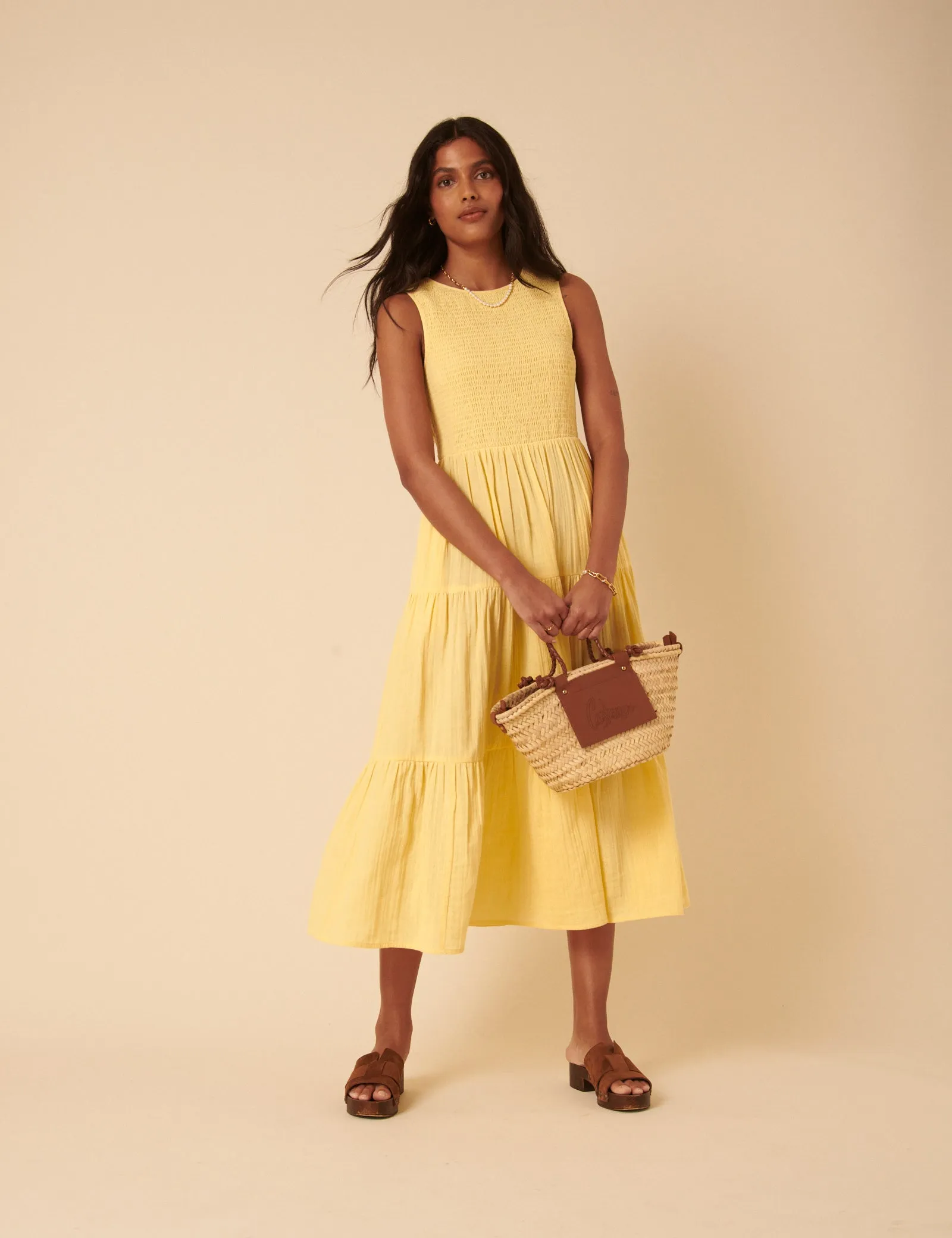 Butter Yellow Sleeveless Tiered Charlie Midi Dress sold by Nobody's Child