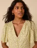 Butter Yellow Ditsy Floral Andie Mini Dress sold by Nobody's Child