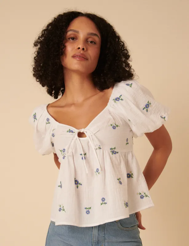 White Floral Embroidererd Puff Sleeve Top sold by Nobody's Child