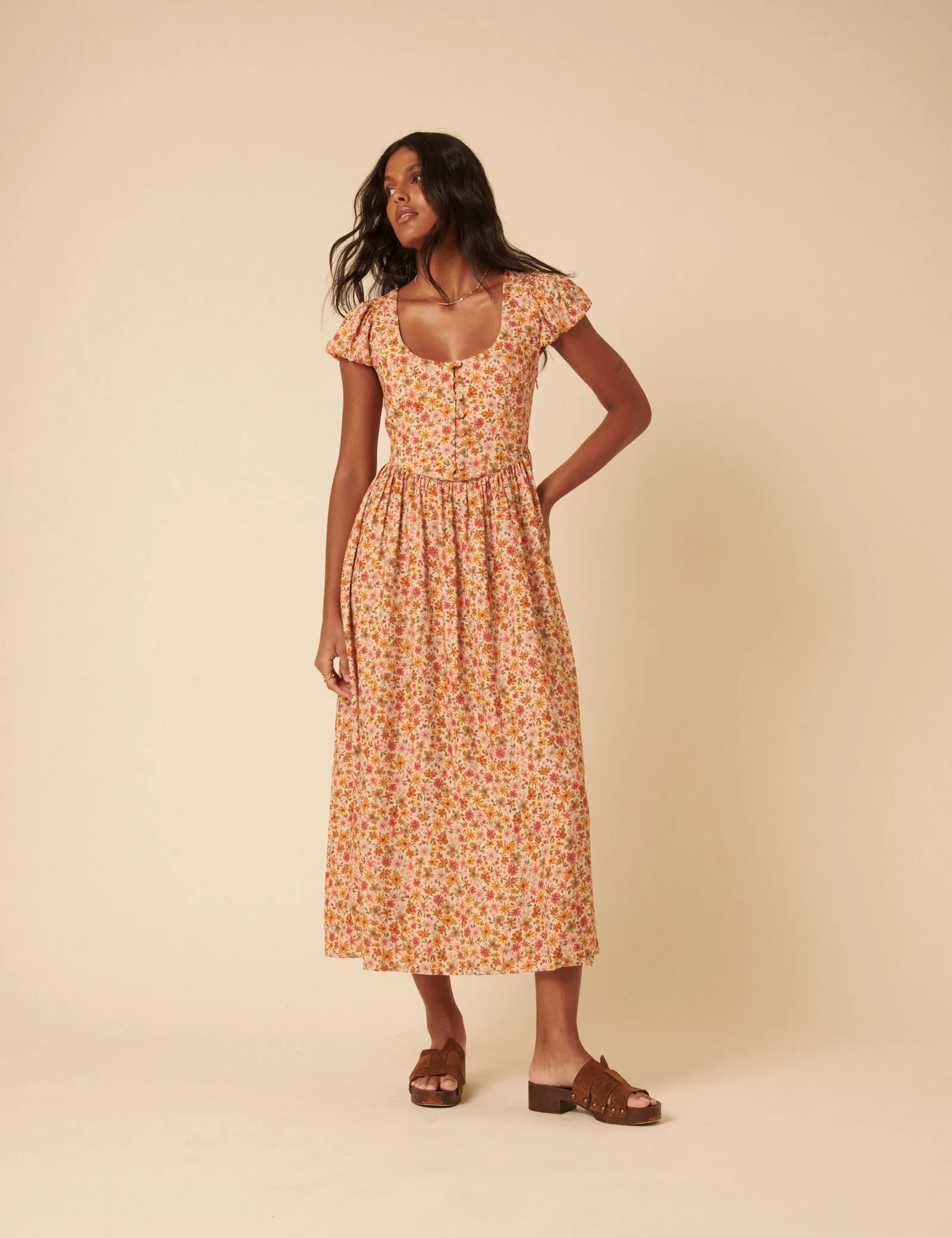 Orange Floral Puff Sleeve Cora Midi Dress sold by Nobody's Child