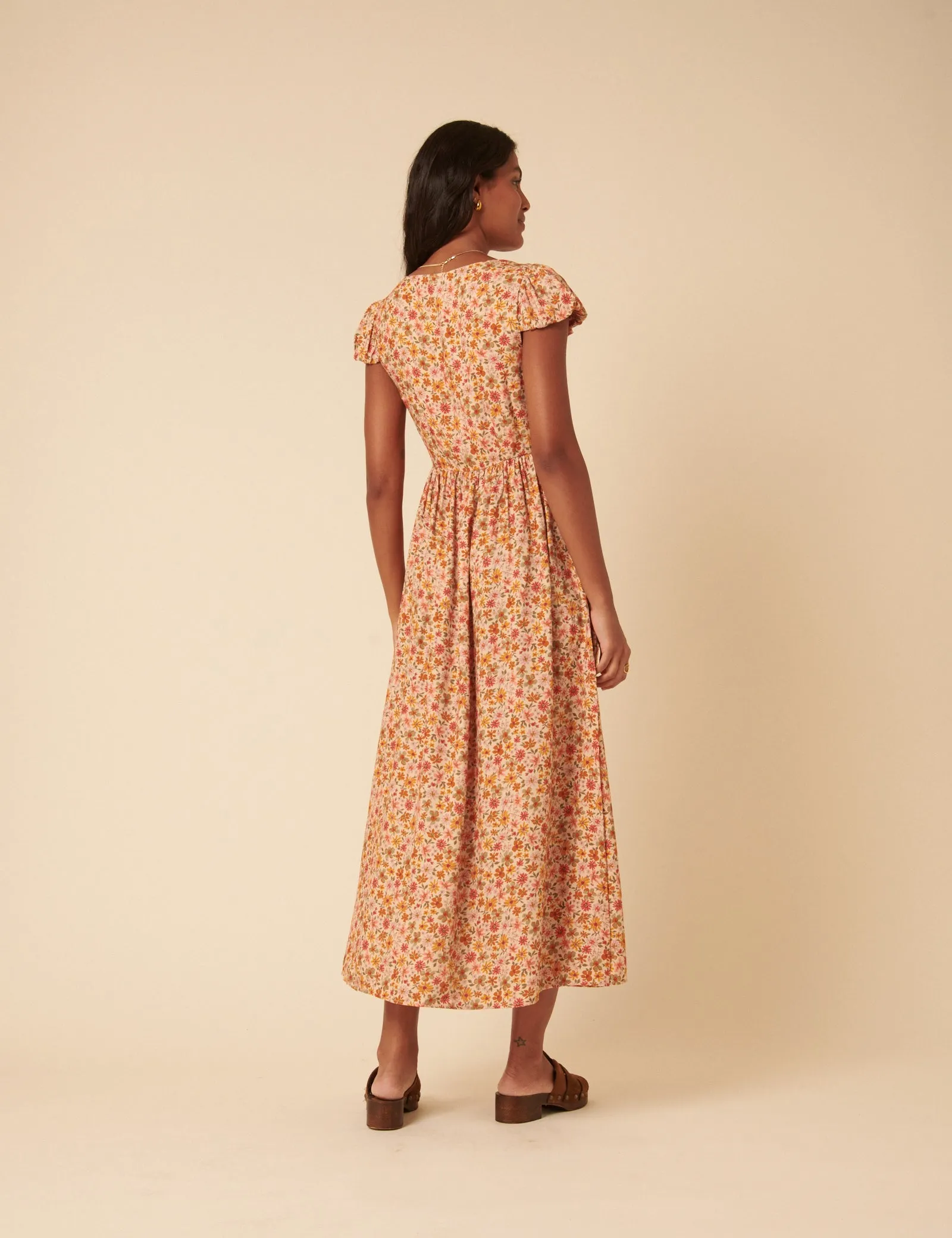 Orange Floral Puff Sleeve Cora Midi Dress sold by Nobody's Child product image thumbnail 5