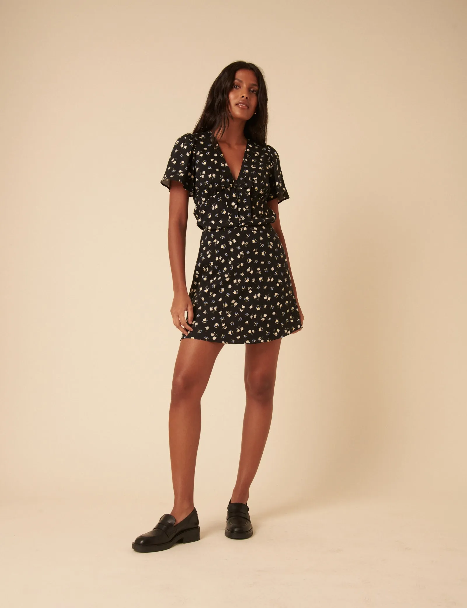 Black Ditsy Floral Mini Skirt sold by Nobody's Child