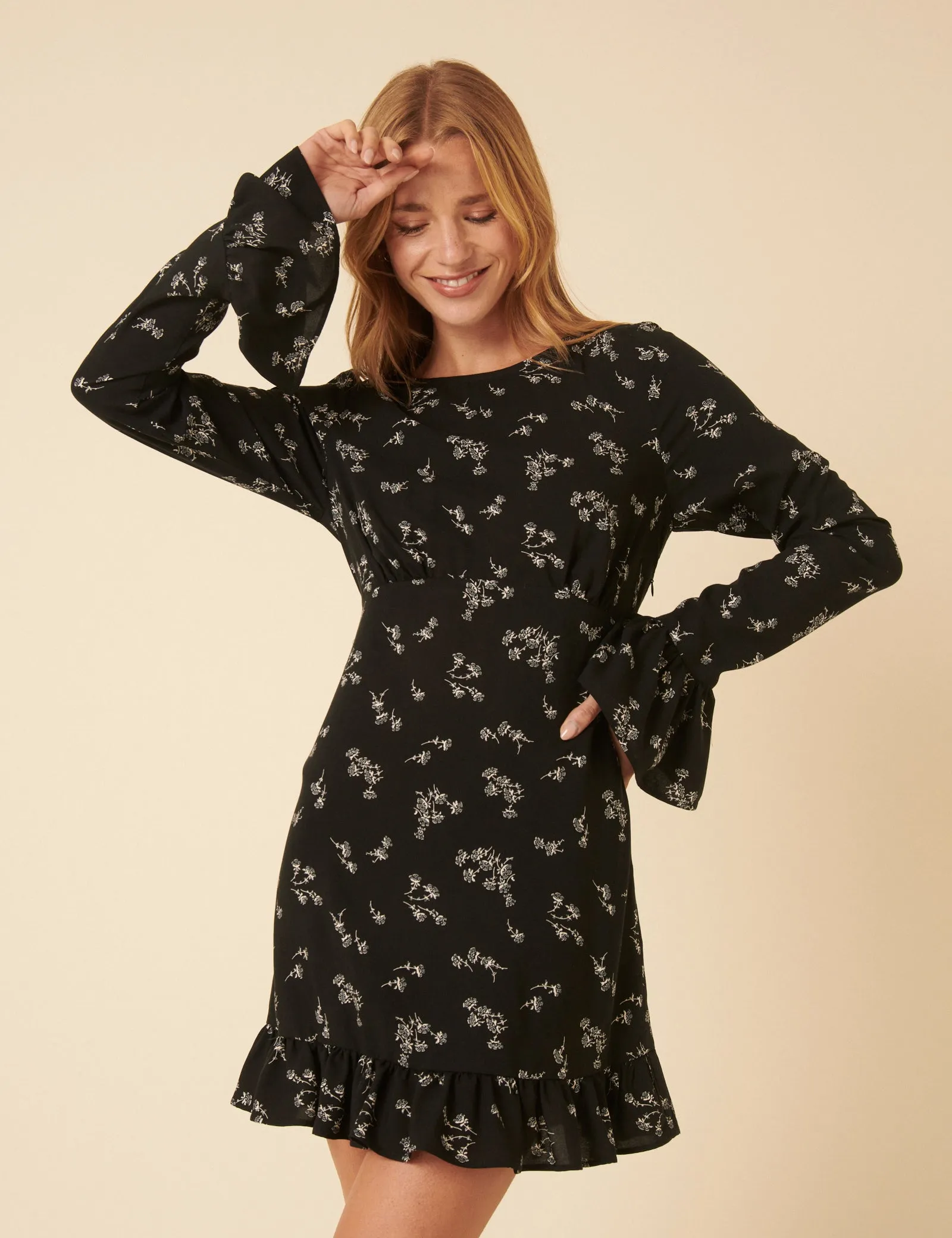 Black Floral Flute Sleeve Bella Mini Dress sold by Nobody's Child