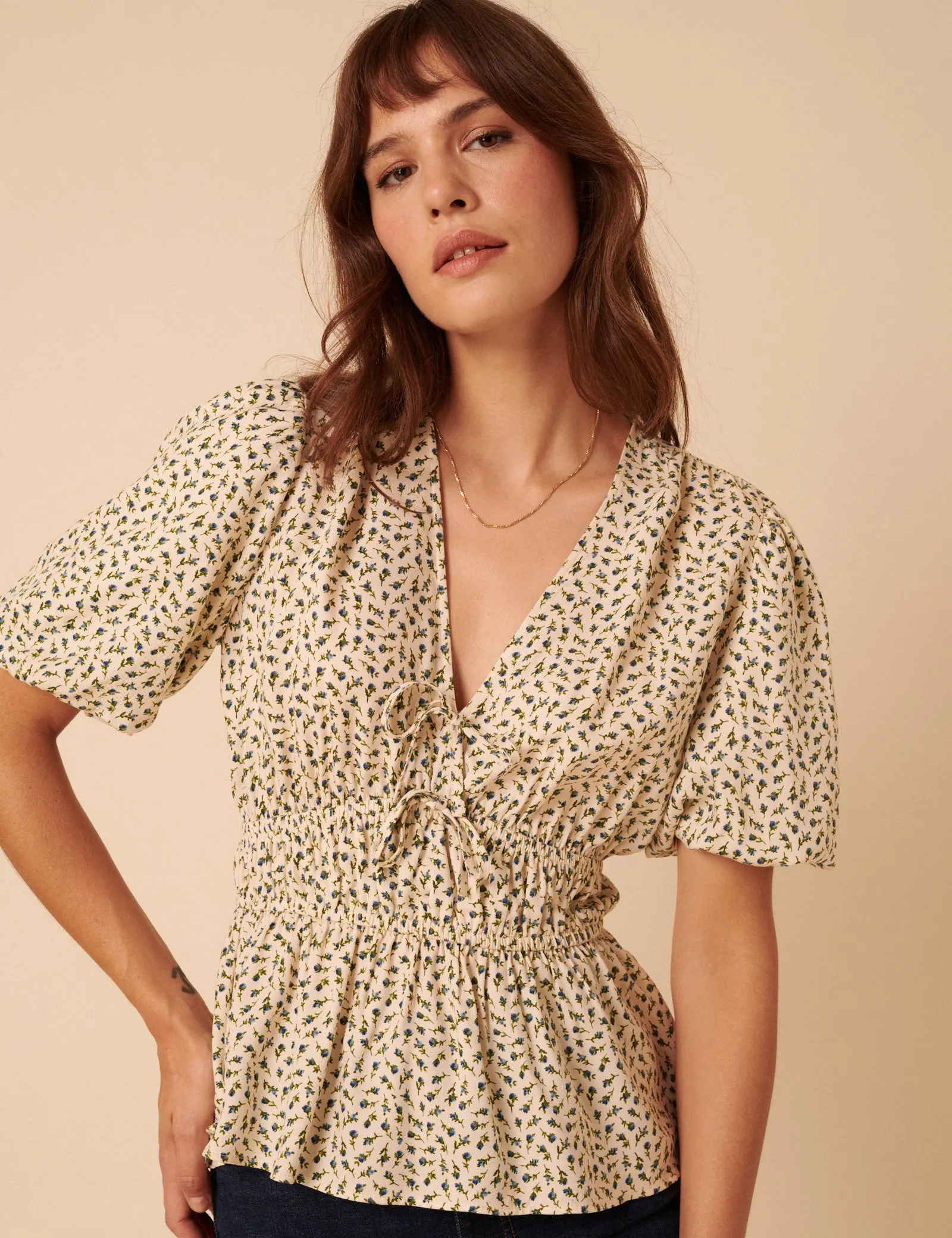 Cream Ditsy Floral V-Neck Blouse sold by Nobody's Child