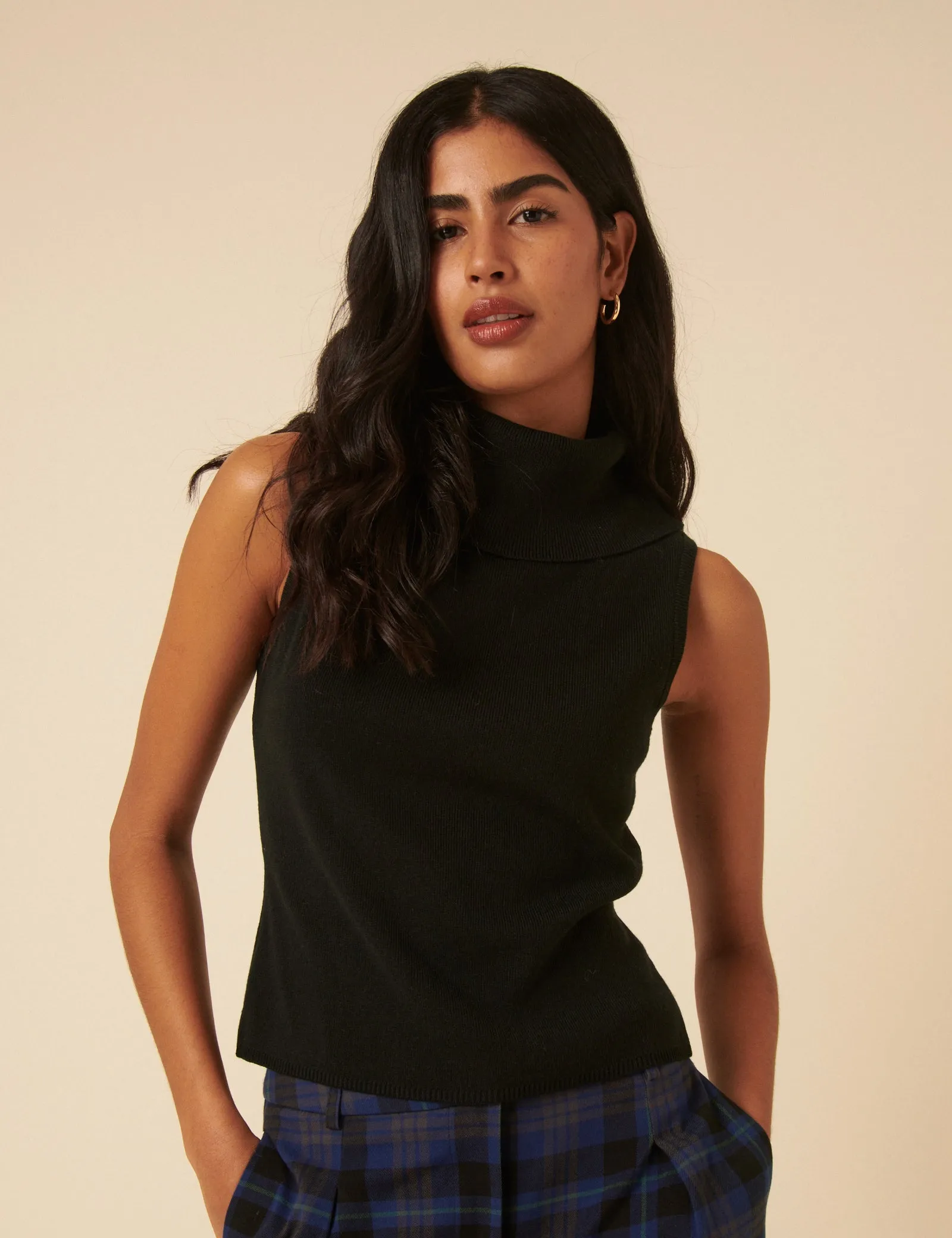 Black Ribbed Knitted Roll Neck Vest Top sold by Nobody's Child