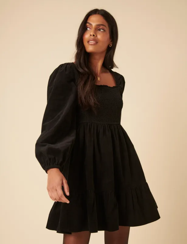 Black Balloon Sleeve Cord Tiered Elsa Mini Dress sold by Nobody's Child