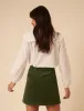 Green Cord Asymmetric Mini Skirt sold by Nobody's Child