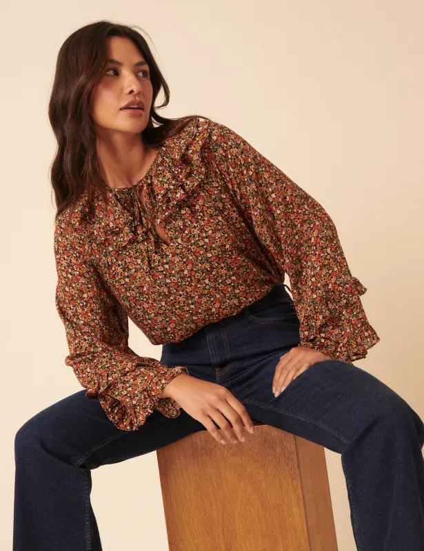 Black Ditsy Floral Flared Sleeve Blouse sold by Nobody's Child