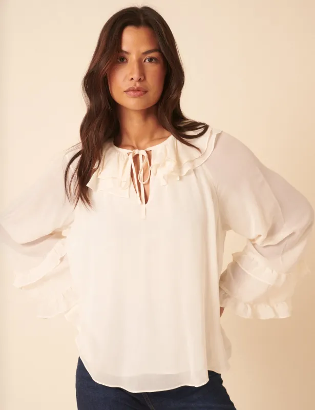 White Long Sleeve Frill Blouse sold by Nobody's Child
