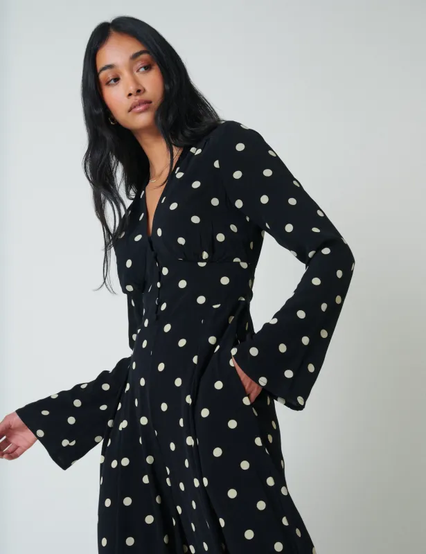 Black Polka Dot Long Sleeve Jumpsuit sold by Nobody's Child