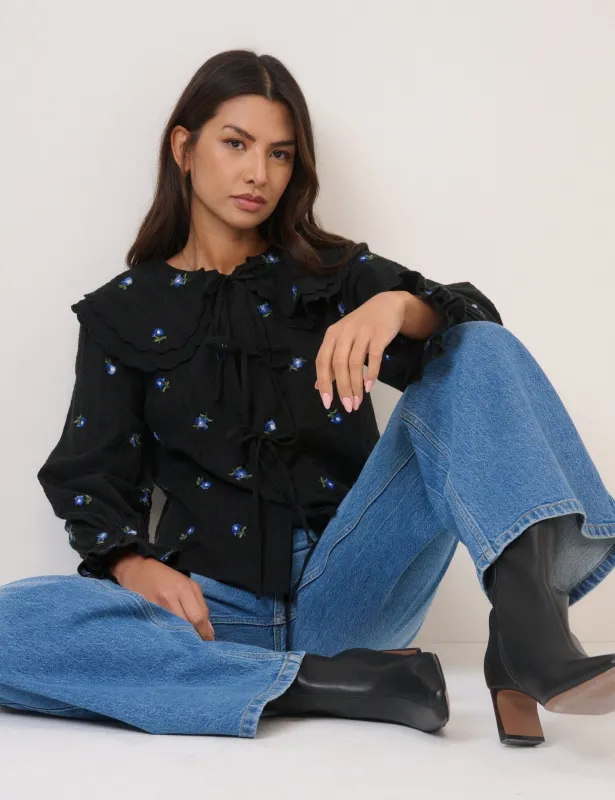 Navy Floral Embroidered Tie Front Top sold by Nobody's Child