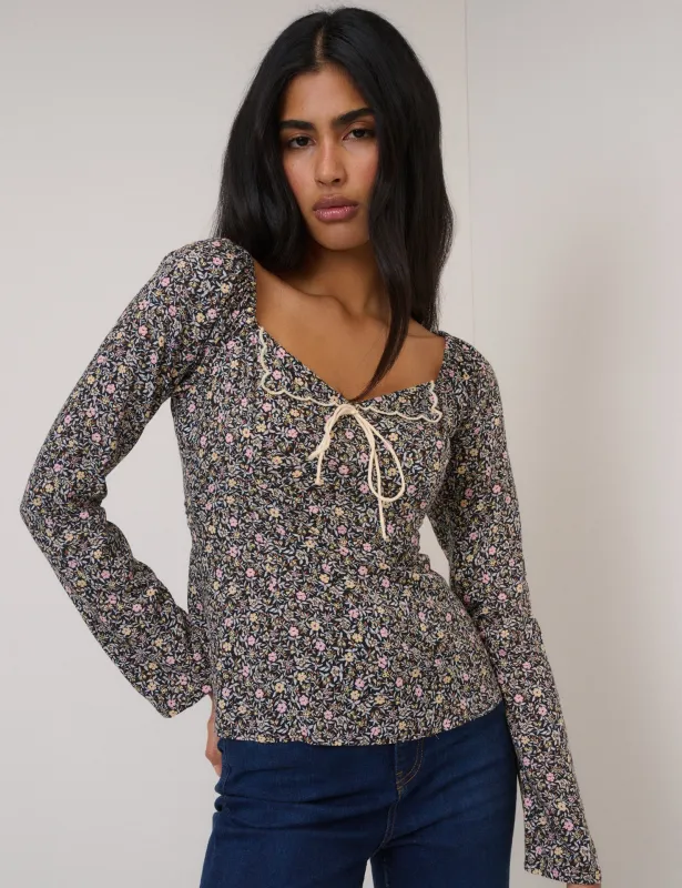 Black Floral Bow Front Top sold by Nobody's Child
