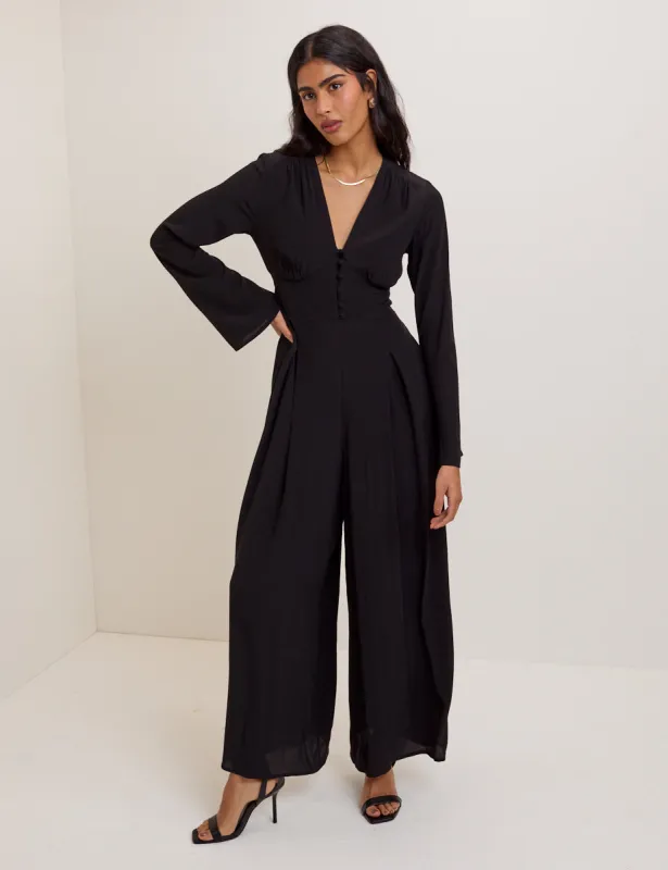 Black Wide Leg Pleated Jumpsuit sold by Nobody's Child
