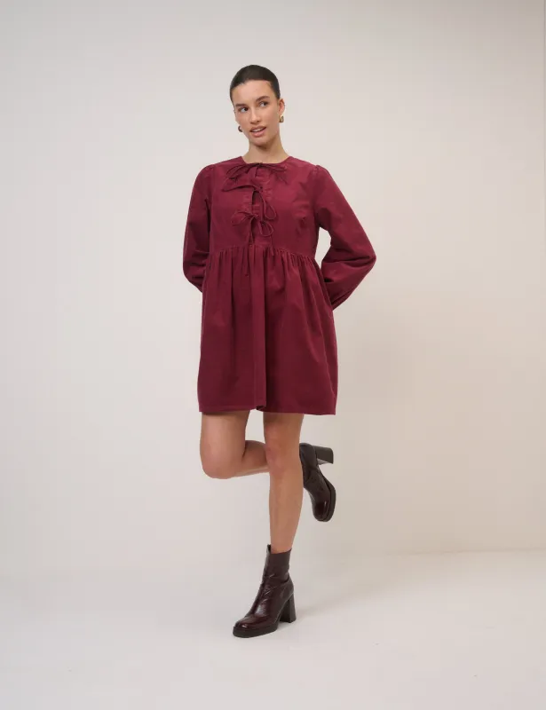 Burgundy Cord Tie Front Eden Mini Dress sold by Nobody's Child