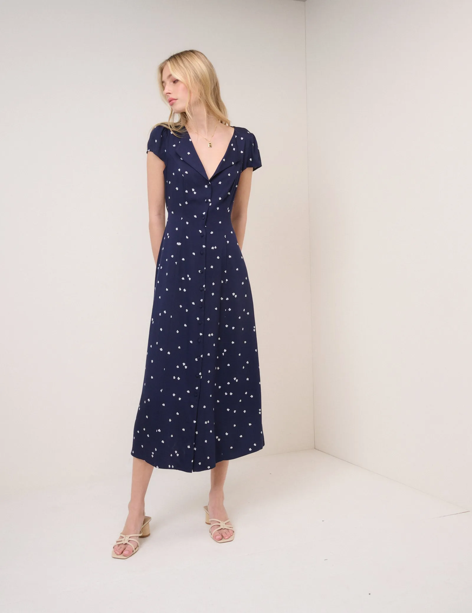 Navy Floral Kitty Midi Dress sold by Nobody's Child