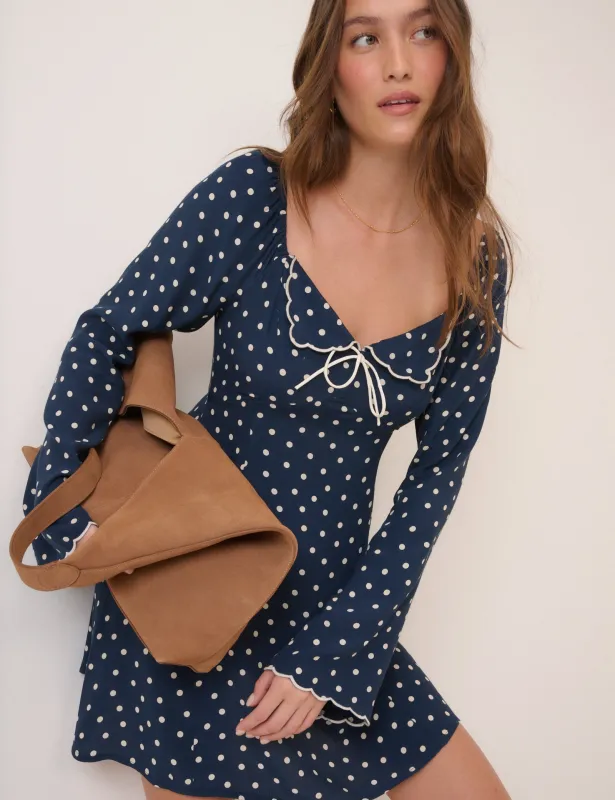 Navy Polka Dot Lyon Mini Dress sold by Nobody's Child