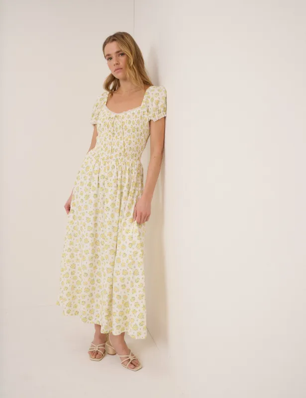 White Ditsy Floral Savanna Midi Dress sold by Nobody's Child