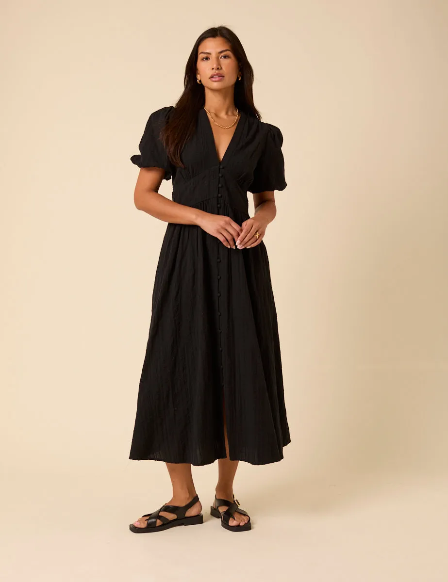 Black Short Sleeve Starlight Midi Dress sold by Nobody's Child