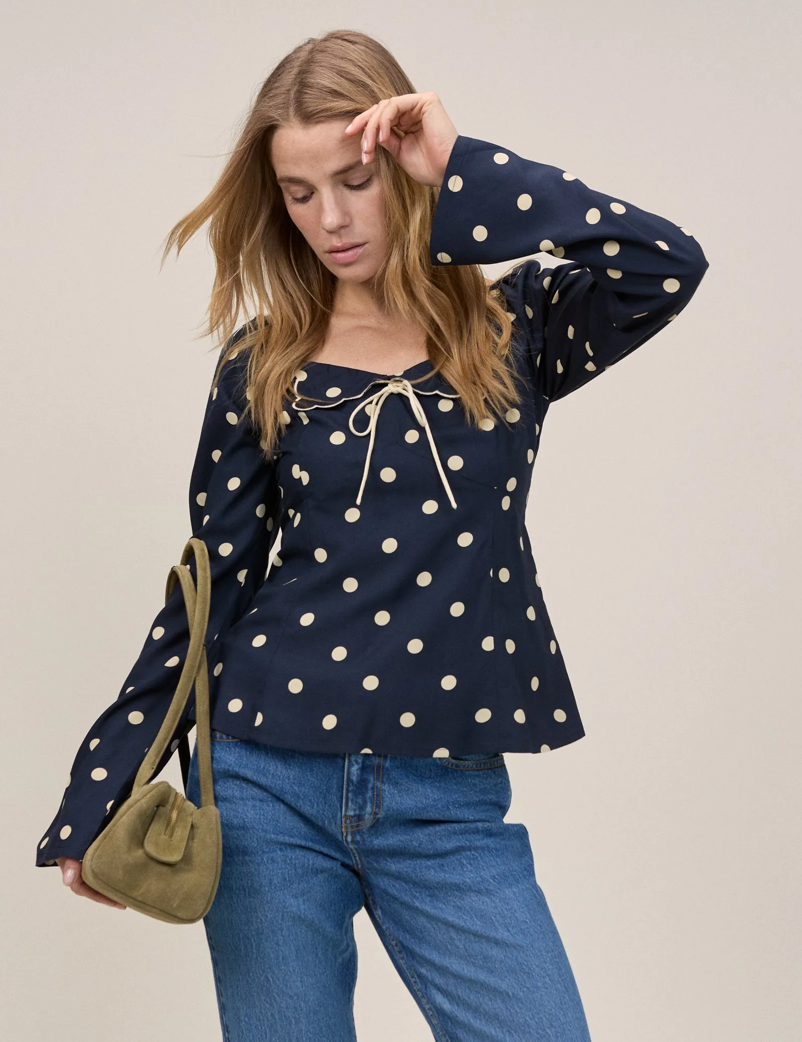 Navy Polka Bow Top sold by Nobody's Child