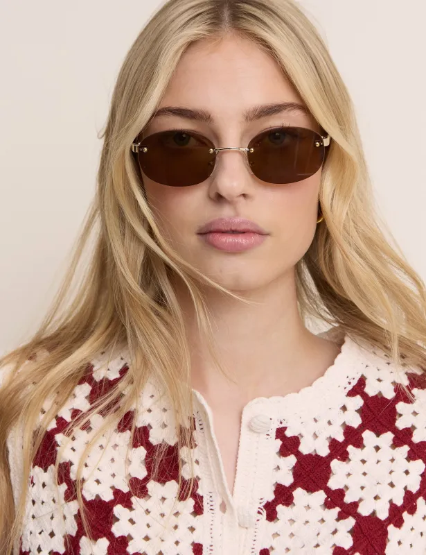 Brown Oval Flare Sunglasses made by Nobody's Child