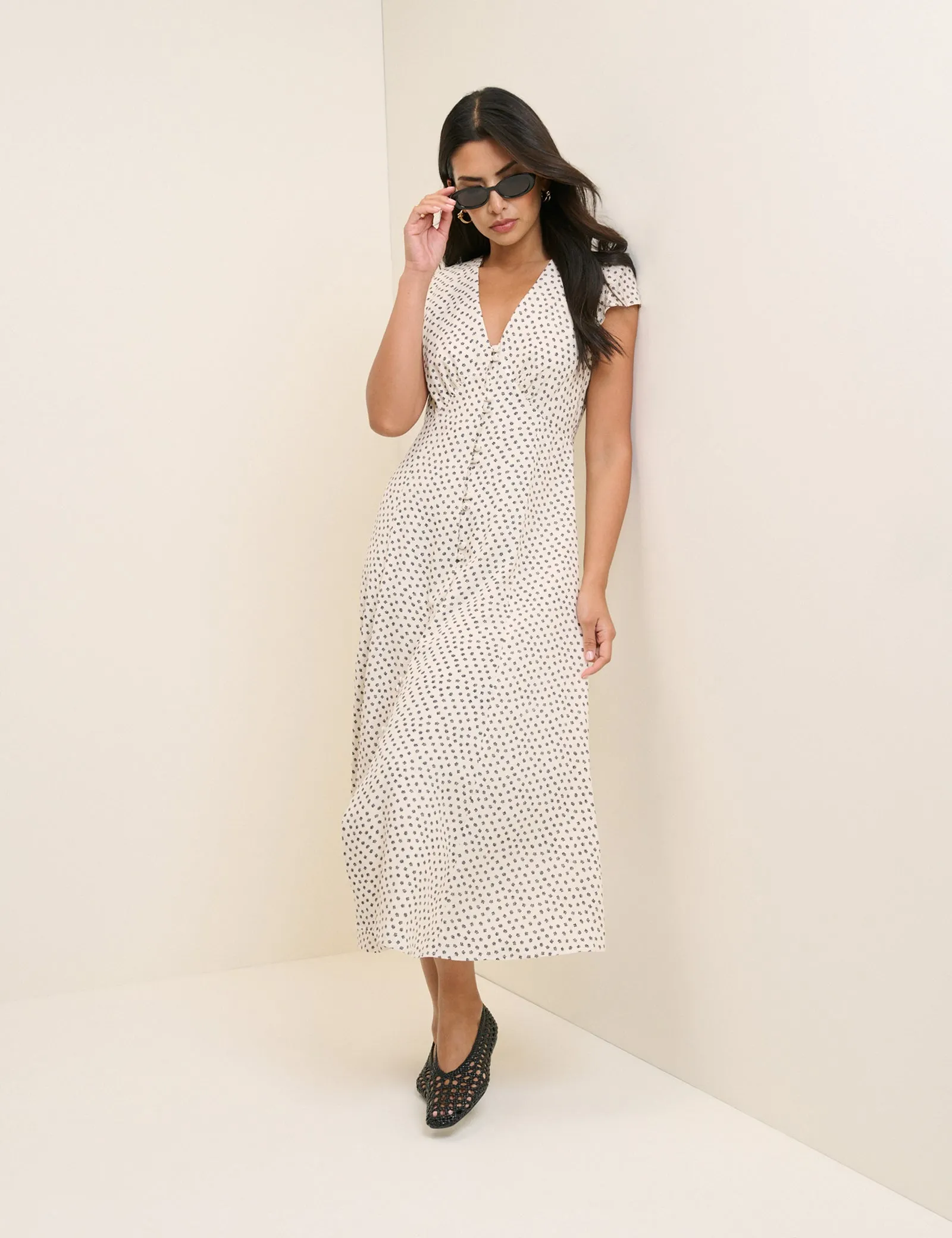 Ivory Ditsy Floral Avery Midi Dress sold by Nobody's Child