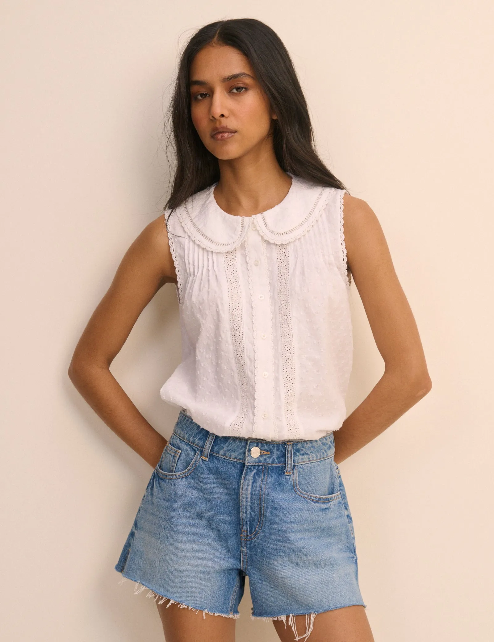 White Peter Pan Collar Sleeveless Blouse sold by Nobody's Child