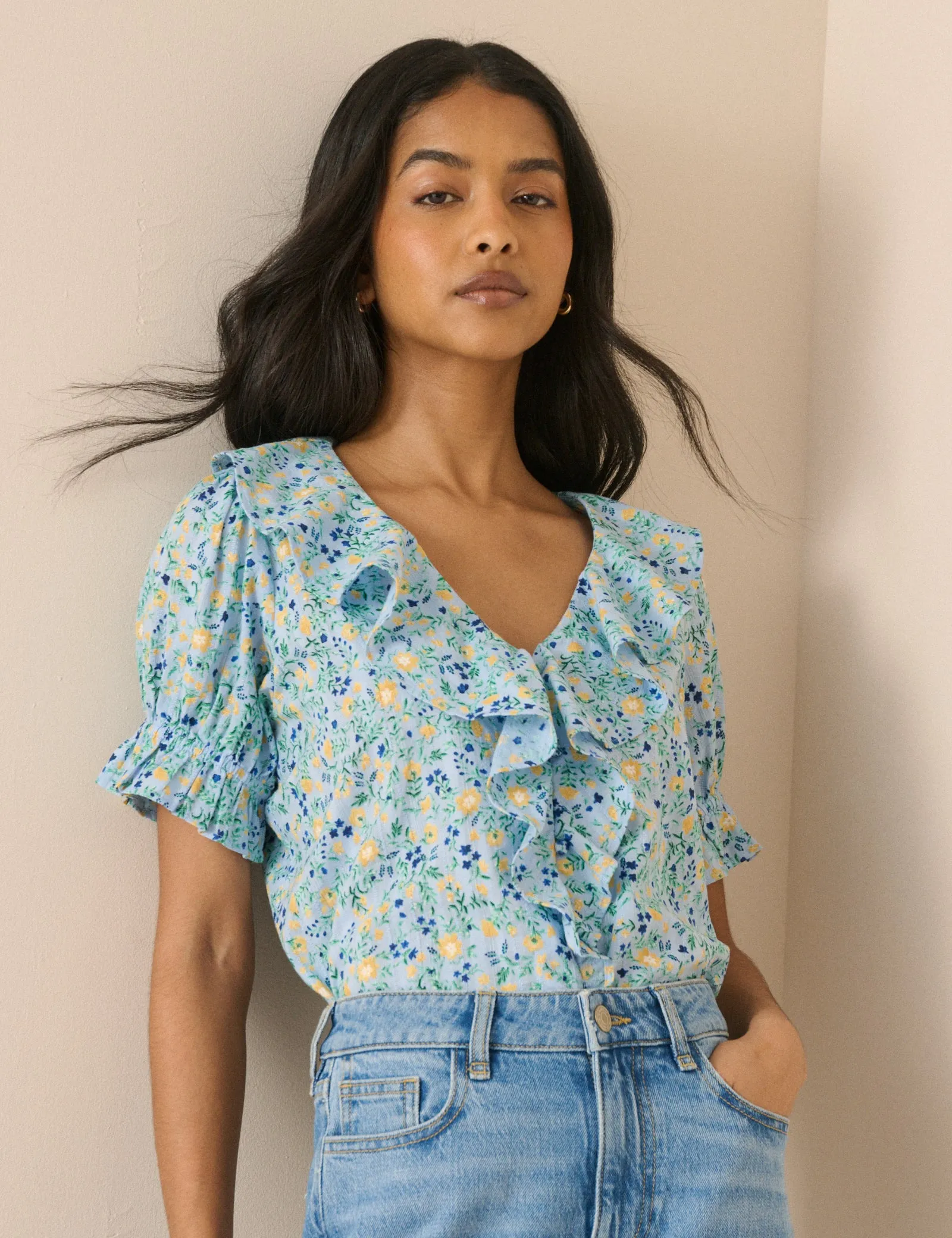Blue Floral Ruffle Trim Top sold by Nobody's Child