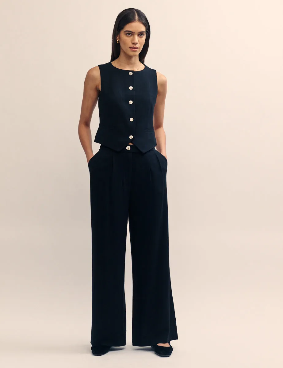 Black Relaxed Tailored Trousers sold by Nobody's Child