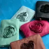 Clutch Rose Cozy Black w. Gold sold by Nunoo Bags