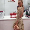 LIA Monogrammed Clutch sold by Olga Berg