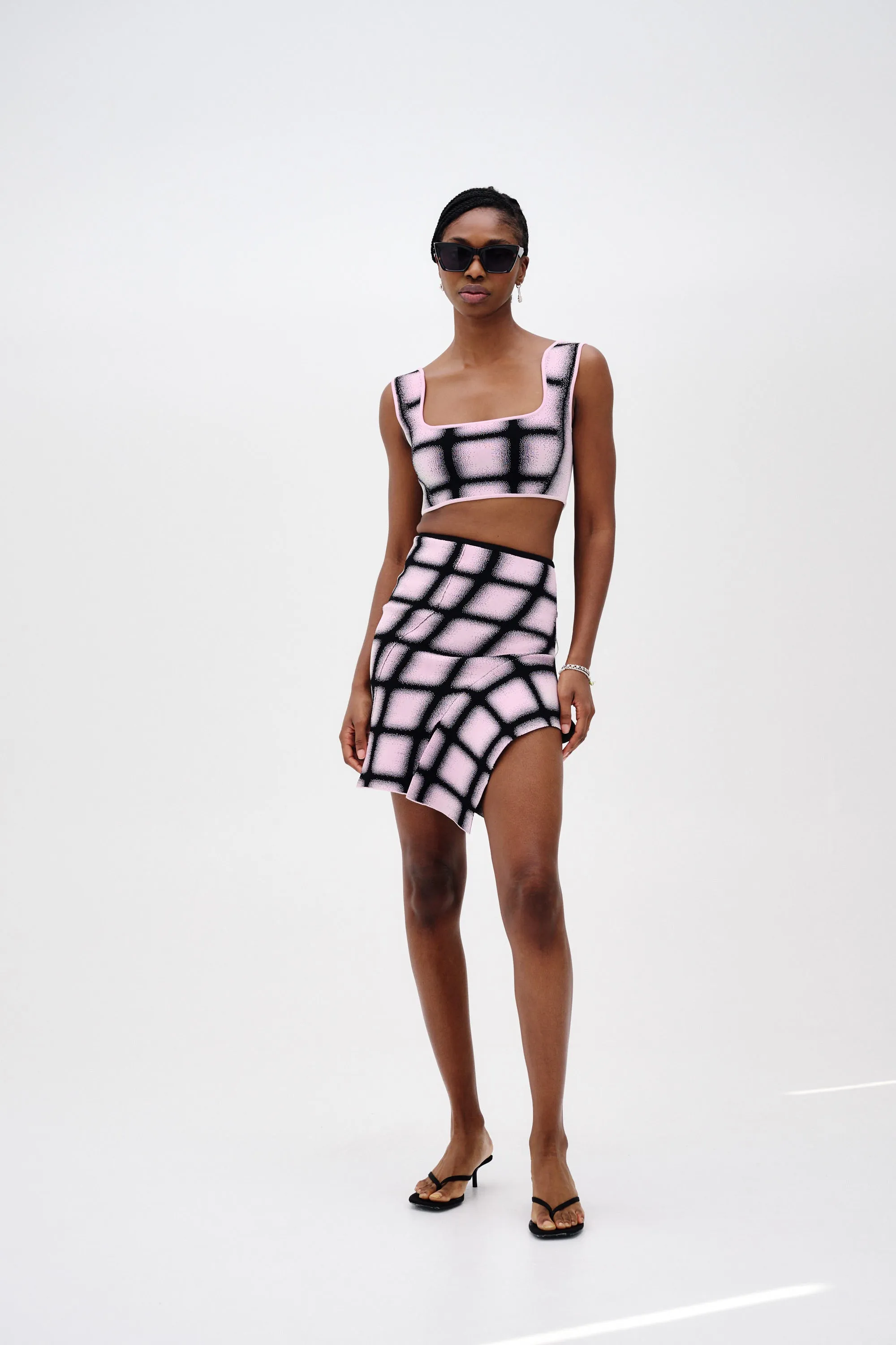 LIZZO UV REACTIVE MINI PLAID SKIRT sold by PH5